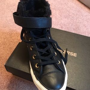 Converse fur lined sneakers